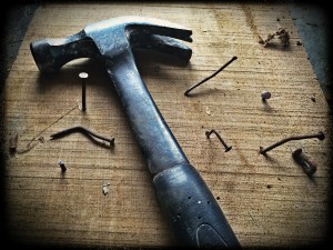 hammer and broken nails on wood surface RDS Environmental Colorado